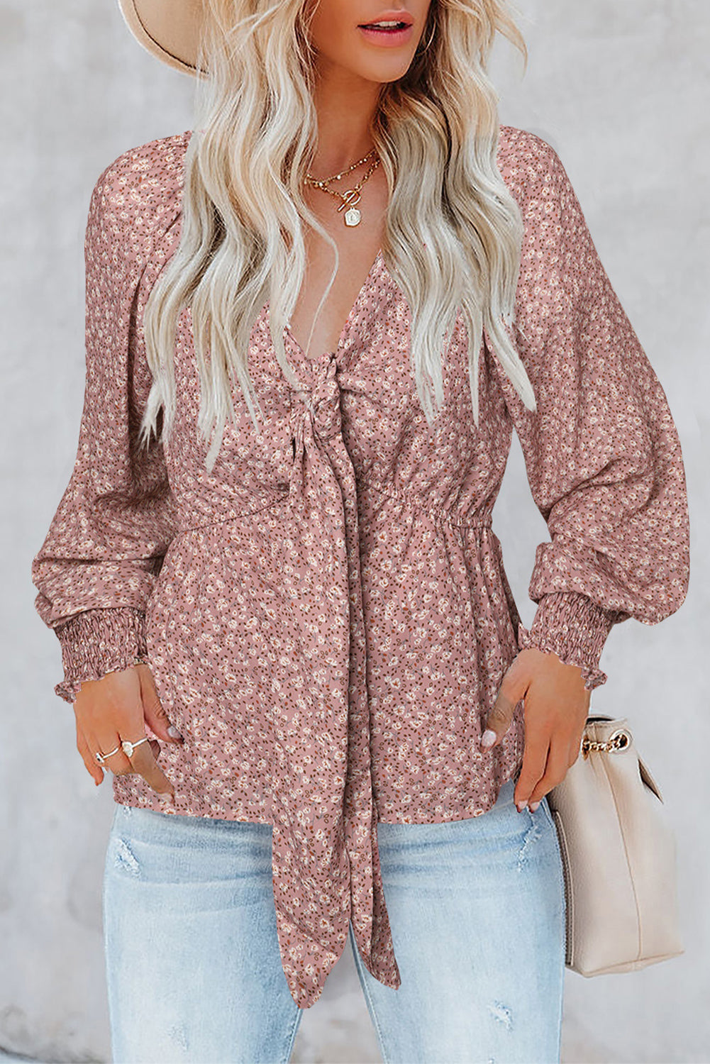 Linda blusa de manga larga con volantes y lazo delantero con estampado floral