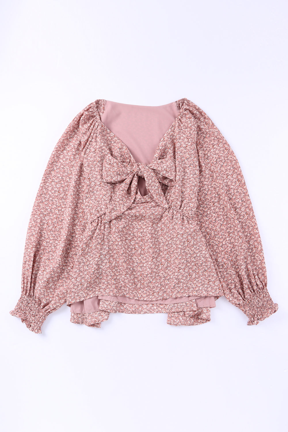 Linda blusa de manga larga con volantes y lazo delantero con estampado floral