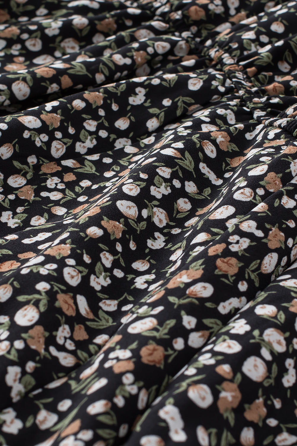 Linda blusa de manga larga con volantes y lazo delantero con estampado floral