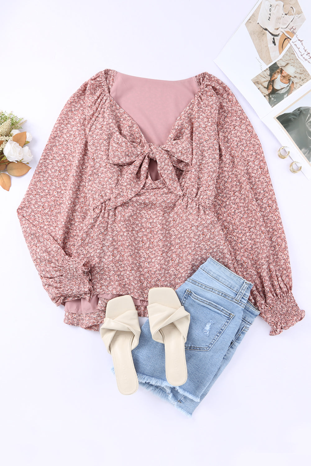 Linda blusa de manga larga con volantes y lazo delantero con estampado floral
