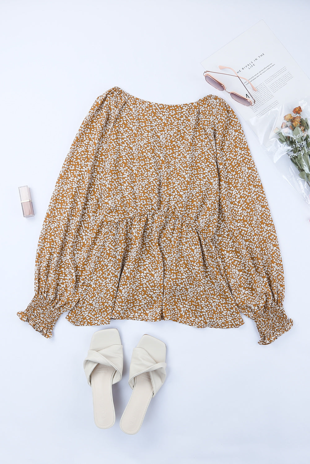 Linda blusa de manga larga con volantes y lazo delantero con estampado floral